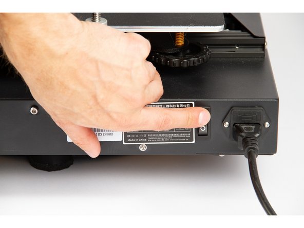 Power on you printer and connect it to your computer using the Micro USB port.